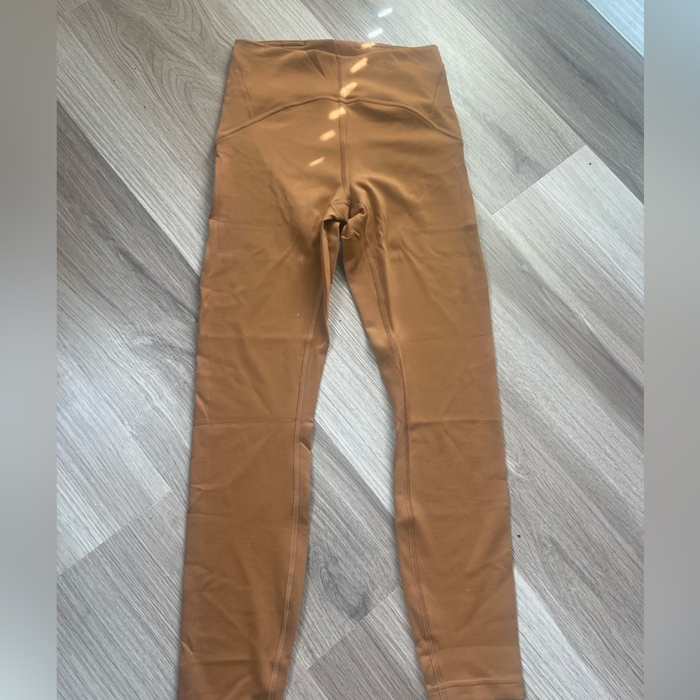 Lululemon - unlimit leggings! A burnt orange/brown! Size 4